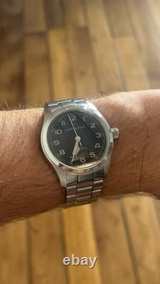 Hamilton Khaki Murph 38mm. Montre Homme Automatique bracelet Acier cadran noir