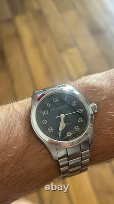 Hamilton Khaki Murph 38mm. Montre Homme Automatique bracelet Acier cadran noir