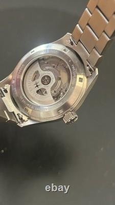 Hamilton Khaki Murph 38mm. Montre Homme Automatique bracelet Acier cadran noir