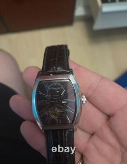 Kenneth Cole Montre Homme automatique tonneau acier cadran noir cuir 34 rubis