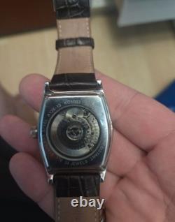 Kenneth Cole Montre Homme automatique tonneau acier cadran noir cuir 34 rubis