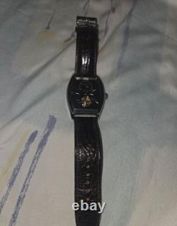 Kenneth Cole Montre Homme automatique tonneau acier cadran noir cuir 34 rubis
