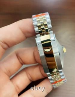 Montre Automatique Homme Lunette Noir et Dorée (Style GMT) Bracelet jubilé Montre Automatique Homme Lunette Noir et Dorée (Style GMT) Bracelet jubilé