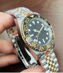 Montre Automatique Homme Lunette Noir et Dorée (Style GMT) Bracelet jubilé Montre Automatique Homme Lunette Noir et Dorée (Style GMT) Bracelet jubilé