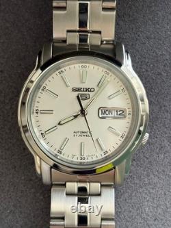 Montre Homme SEIKO 5 SNKL75K1 7S26-03S0 Automatique Cadran Argent Date Jour O
