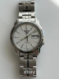 Montre Homme SEIKO 5 SNKL75K1 7S26-03S0 Automatique Cadran Argent Date Jour O