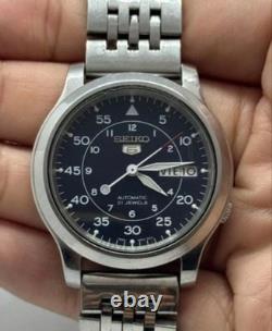 Montre Homme Seiko 5 Cadran Militaire Noir Automatique Acier Inoxydable Occasion Montre Homme Seiko 5 Cadran Militaire Noir Automatique Acier Inoxydable Occasion