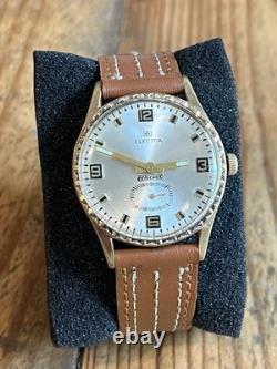 Montre ancienne ELECTRA antichoc plaqué or LIP année 60