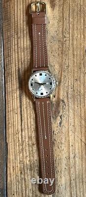 Montre ancienne ELECTRA antichoc plaqué or LIP année 60