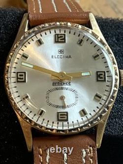 Montre ancienne ELECTRA antichoc plaqué or LIP année 60