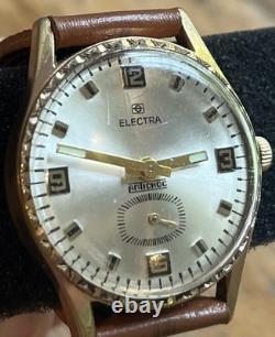 Montre ancienne ELECTRA antichoc plaqué or LIP année 60