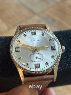 Montre ancienne ELECTRA antichoc plaqué or LIP année 60