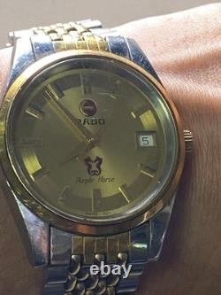 Montre automatique RADO cheval violet 35 mm cadran doré fonctionnelle vintage Montre automatique RADO cheval violet 35 mm cadran doré fonctionnelle vintage