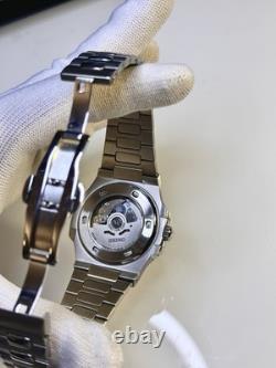 Montre automatique custom seikoNH38 open heart bleu homme