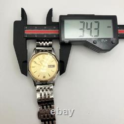 Montre automatique homme Citizen cadran doré affichage de la date 4-R07540