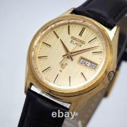Montre automatique homme SEIKO 0703-7020 date jour vintage occasion fabricati