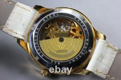 Montre automatique pour homme OUYAWEI or argent pierres colorées presque comm