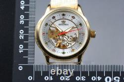 Montre automatique pour homme OUYAWEI or argent pierres colorées presque comm