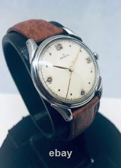 Montre vintage Zenith mécanique, tout acier, révisée