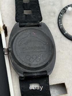 Montre vintage rare Eloga Flipper automatique tropical 20atm jeux olympique 37mm Montre vintage rare Eloga Flipper automatique tropical 20atm jeux olympique 37mm