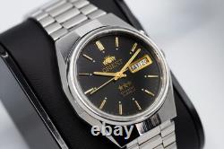 Orient Tri Star Révisée Automatique (46943) jour/date cadran noir acier