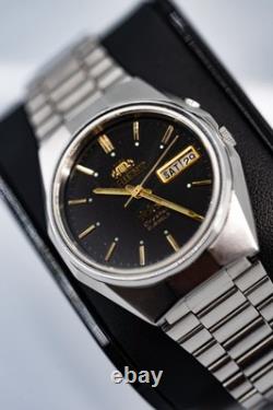 Orient Tri Star Révisée Automatique (46943) jour/date cadran noir acier