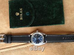 Rolex 6556 case n°138781, montre automatique, cadran bleu Airking signé singer