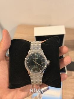 Seiko Presage SRPE15J1 automatique cadran vert acier date dos transparent
