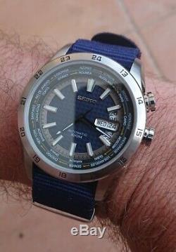 Seiko World Time GMT Automatique, bleu, lunette interne rotative 100m Neuve